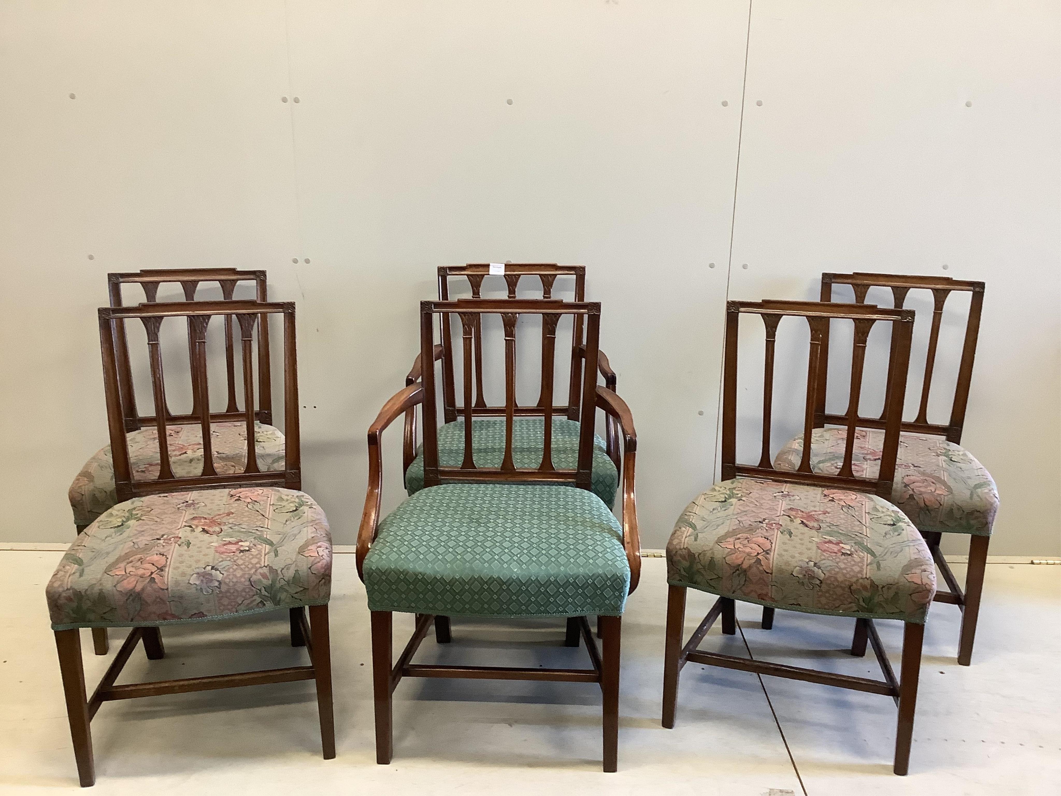 A set of six Sheraton style mahogany dining chairs (two with arms). Condition - fair